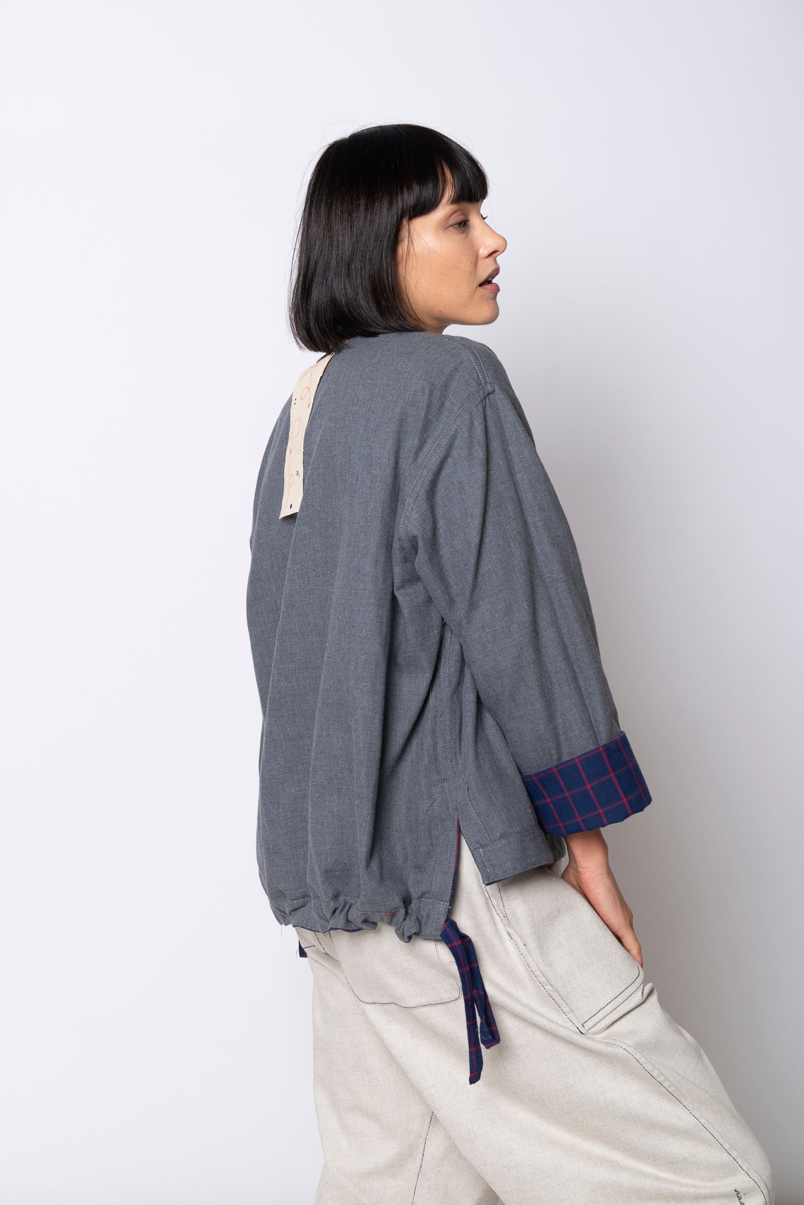 Blusa a quadri double face con coulisse Mod. Re:spiro