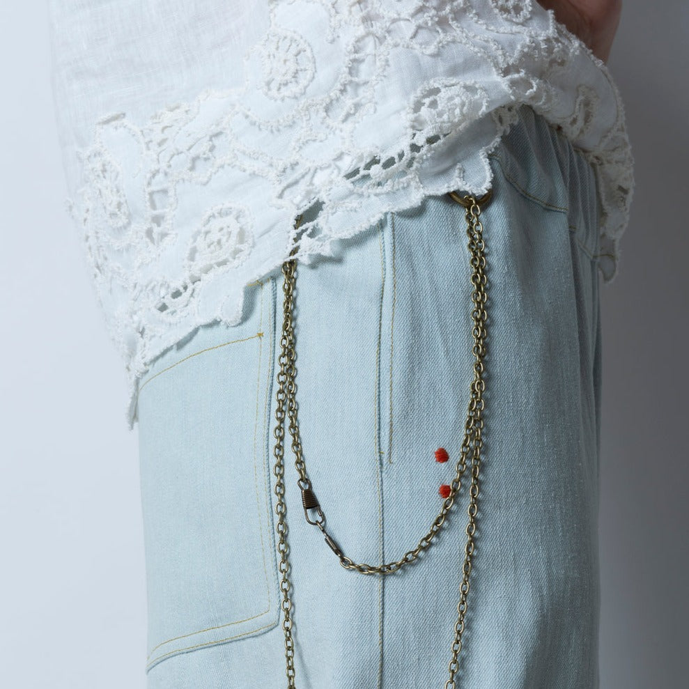 Top in puro lino fondo in macramè